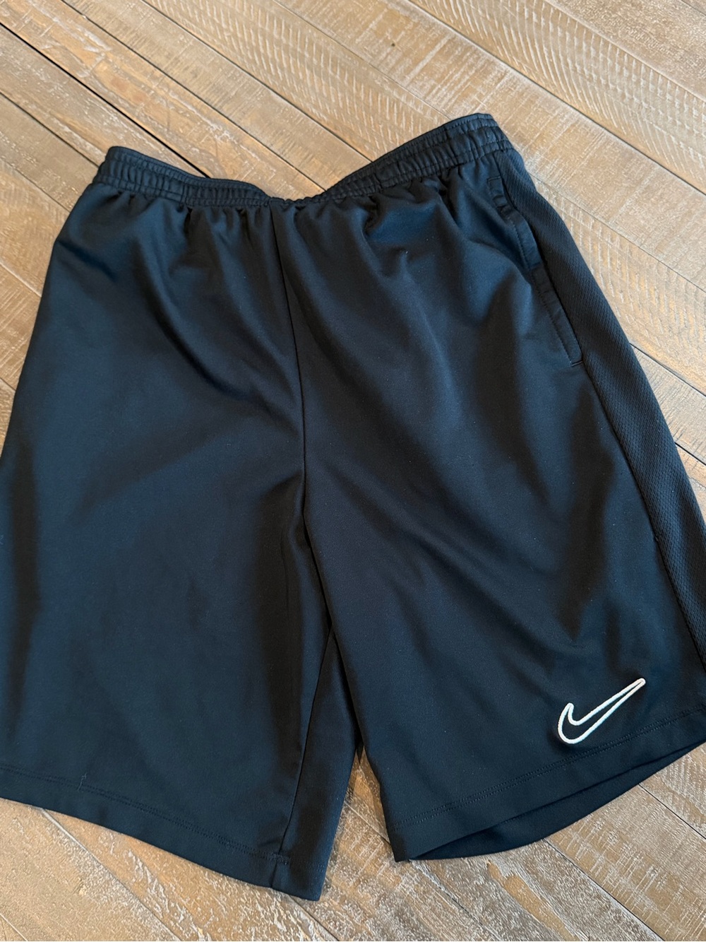 Nike Men’s Black Athletic Shorts with White Swoosh Accent